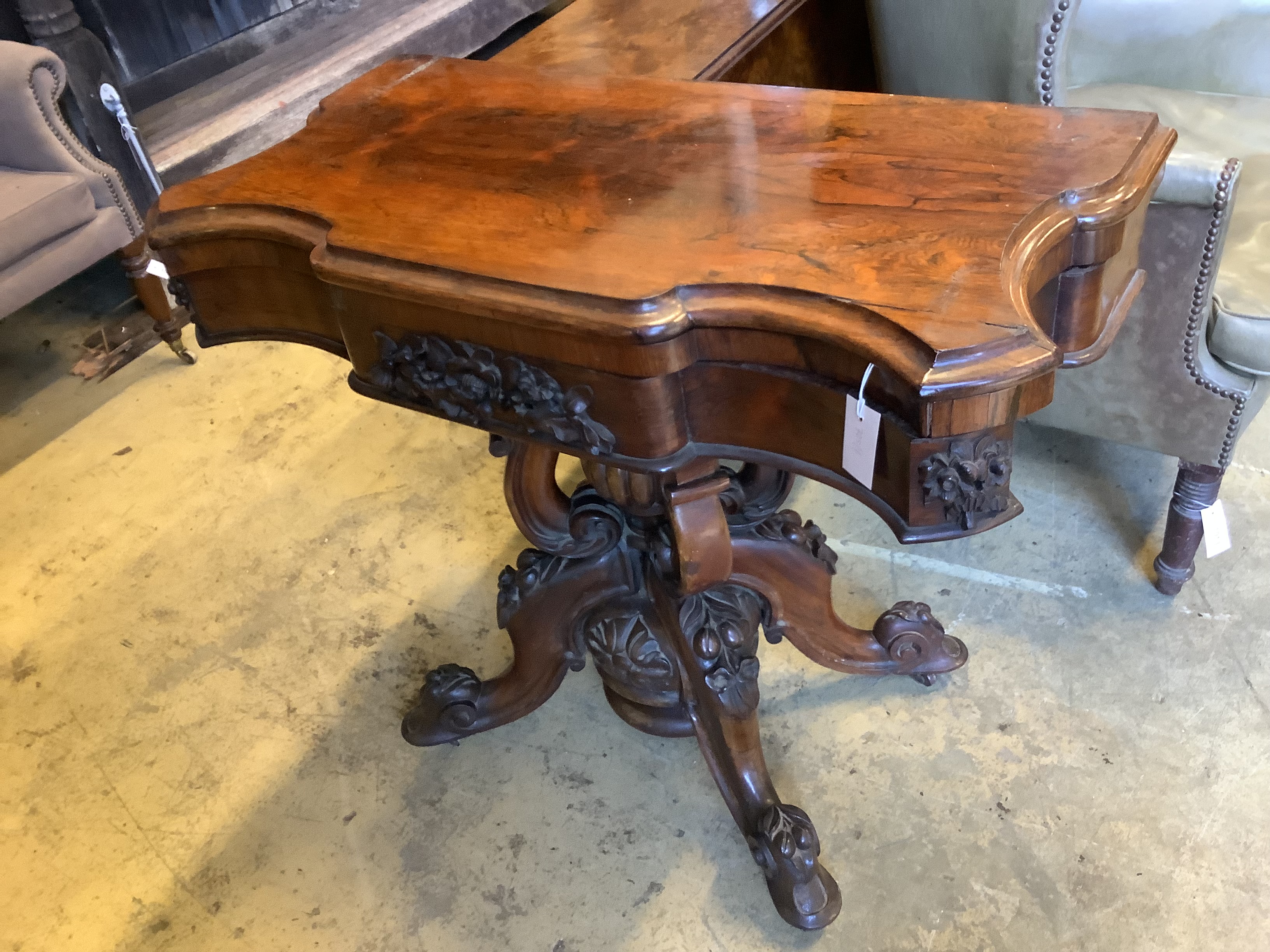 A 19th century continental folding rosewood card table, width 92cm, depth 46cm, height 80cm